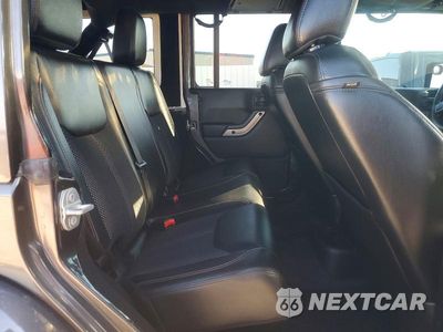 Zdjęcie 11 z 13 samochodu: 2016 JEEP WRANGLER UNLIMITED SAHARA VIN:1C4HJWEG2GL333432 - miniatura