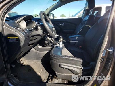 Zdjęcie 7 z 14 samochodu: 2013 HYUNDAI TUCSON GLS VIN:KM8JUCAC3DU618619 - miniatura