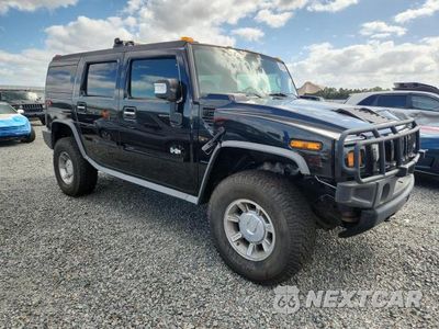 Czwarte zdjęcie samochodu z boku: 2007 HUMMER H2 VIN:5GRGN23U97H111215 - miniatura