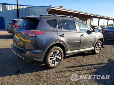 Trzecie zdjęcie samochodu z tyłu: 2018 TOYOTA RAV4 HYBRID LE VIN:JTMRJREV0JD235571 - miniatura