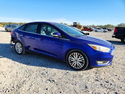 Czwarte zdjęcie samochodu z boku: 2015 FORD FOCUS TITANIUM VIN:1FADP3J2XFL323998 - miniatura