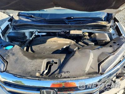 Zdjęcie 11 z 12 samochodu: 2017 HONDA PILOT TOURING VIN:5FNYF5H99HB017264 - miniatura