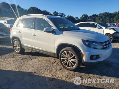 Czwarte zdjęcie samochodu z boku: 2016 VOLKSWAGEN TIGUAN S VIN:WVGAV7AX4GW589874 - miniatura