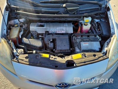 Zdjęcie 11 z 12 samochodu: 2012 TOYOTA PRIUS THREE VIN:JTDKN3DU6C5408552 - miniatura