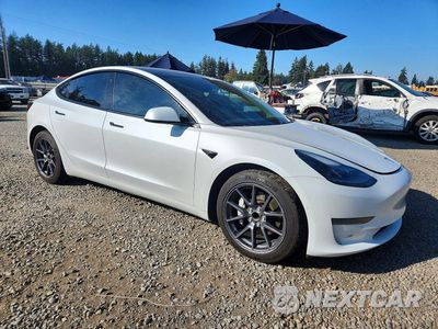 Czwarte zdjęcie samochodu z boku: 2021 TESLA MODEL 3 VIN:5YJ3E1EAXMF996579 - miniatura