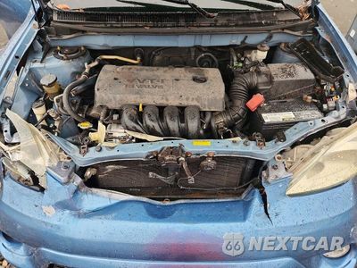 Zdjęcie 11 z 12 samochodu: 2005 TOYOTA MATRIX XR VIN:2T1KR32E15C414507 - miniatura