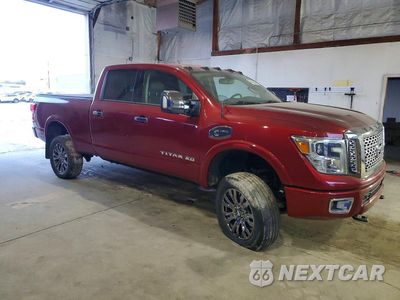 Czwarte zdjęcie samochodu z boku: 2016 NISSAN TITAN XD PLATINUM RESERVE VIN:1N6BA1F40GN515712 - miniatura