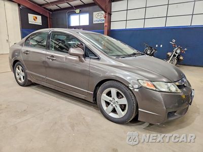 Czwarte zdjęcie samochodu z boku: 2009 HONDA CIVIC LX-S VIN:2HGFA16639H511057 - miniatura