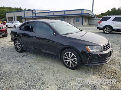 Czwarte zdjęcie samochodu z boku: 2017 VOLKSWAGEN JETTA SE VIN:3VWDB7AJ4HM227970 - miniatura