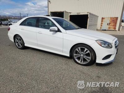 Czwarte zdjęcie samochodu z boku: 2015 MERCEDES-BENZ E 350 VIN:WDDHF5KBXFB121988 - miniatura