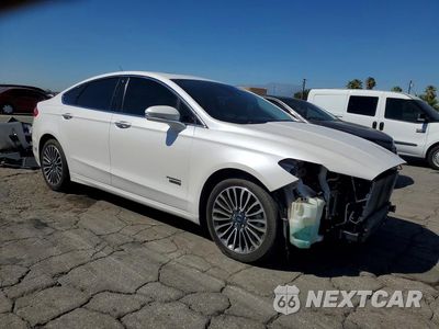Czwarte zdjęcie samochodu z boku: 2017 FORD FUSION TITANIUM PHEV VIN:3FA6P0SU6HR254013 - miniatura