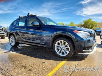 Czwarte zdjęcie samochodu z boku: 2015 BMW X1 XDRIVE28I VIN:WBAVL1C53FVY39434 - miniatura