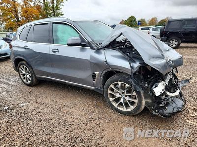 Czwarte zdjęcie samochodu z boku: 2026 BMW X5 XDRIVE50E VIN:5UX43EU06T9023250 - miniatura