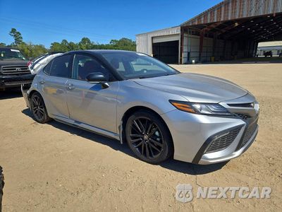 Czwarte zdjęcie samochodu z boku: 2024 TOYOTA CAMRY XSE VIN:4T1K61AK9RU211812 - miniatura