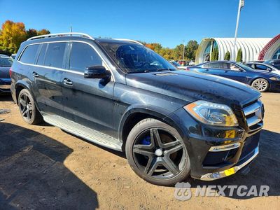 Czwarte zdjęcie samochodu z boku: 2015 MERCEDES-BENZ GL 550 4MATIC VIN:4JGDF7DE9FA608550 - miniatura