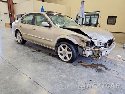 Czwarte zdjęcie samochodu z boku: 2000 NISSAN MAXIMA GXE VIN:JN1CA31D4YT521040 - miniatura