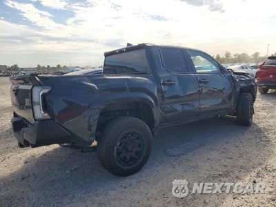 Trzecie zdjęcie samochodu z tyłu: 2026 TOYOTA TACOMA SR VIN:3TYKD5HN2TT052780 - miniatura