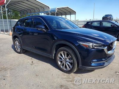 Czwarte zdjęcie samochodu z boku: 2020 MAZDA CX-5 GRAND TOURING VIN:JM3KFADM4L0731603 - miniatura