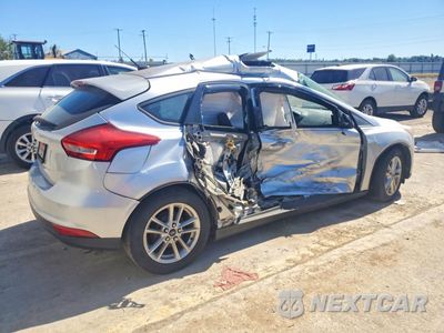 Trzecie zdjęcie samochodu z tyłu: 2016 FORD FOCUS SE VIN:1FADP3K24GL216400 - miniatura