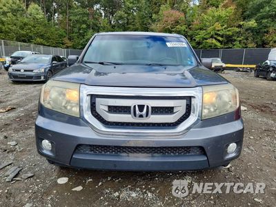 Piąte zdjęcie samochodu w środku: 2011 HONDA PILOT EXL VIN:5FNYF4H64BB089478 - miniatura