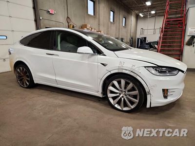 Czwarte zdjęcie samochodu z boku: 2016 TESLA MODEL X VIN:5YJXCAE26GF030329 - miniatura