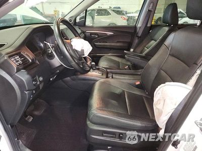 Zdjęcie 7 z 13 samochodu: 2021 HONDA PILOT SE VIN:5FNYF5H25MB037234 - miniatura