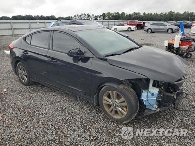 Czwarte zdjęcie samochodu z boku: 2018 HYUNDAI ELANTRA VALUE EDITION VIN:5NPD84LF5JH220059 - miniatura