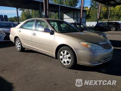 Czwarte zdjęcie samochodu z boku: 2003 TOYOTA CAMRY LE VIN:JTDBE32K130143182 - miniatura