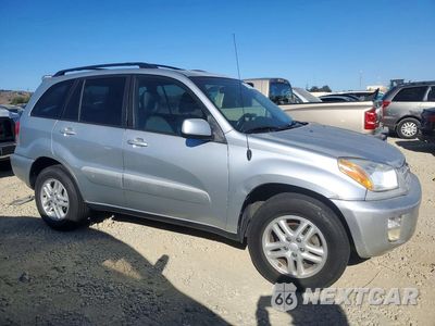 Czwarte zdjęcie samochodu z boku: 2002 TOYOTA RAV4 BASE VIN:JTEGH20V820049041 - miniatura