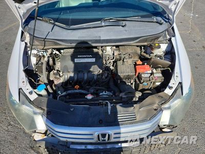 Zdjęcie 11 z 12 samochodu: 2010 HONDA INSIGHT EX VIN:JHMZE2H78AS008907 - miniatura