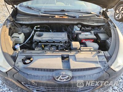 Zdjęcie 11 z 13 samochodu: 2012 HYUNDAI TUCSON GLS VIN:KM8JUCAC5CU341194 - miniatura