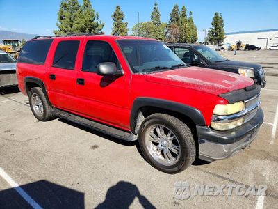Czwarte zdjęcie samochodu z boku: 2000 CHEVROLET SUBURBAN C1500 VIN:3GNEC16T3YG164314 - miniatura