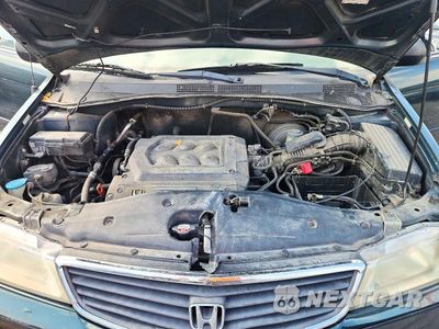 Zdjęcie 12 z 13 samochodu: 2000 HONDA ODYSSEY LX VIN:2HKRL185XYH601421 - miniatura