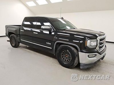Czwarte zdjęcie samochodu z boku: 2017 GMC SIERRA C1500 SLT VIN:3GTP1NEC5HG451833 - miniatura