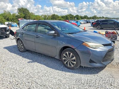 Czwarte zdjęcie samochodu z boku: 2017 TOYOTA COROLLA L VIN:5YFBURHE0HP599064 - miniatura