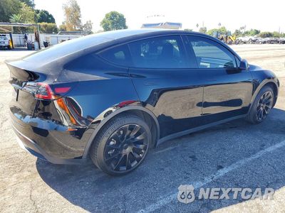Trzecie zdjęcie samochodu z tyłu: 2022 TESLA MODEL Y VIN:7SAYGDEE2NF352079 - miniatura