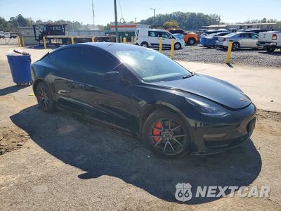 Czwarte zdjęcie samochodu z boku: 2022 TESLA MODEL 3 VIN:5YJ3E1EAXNF369592 - miniatura