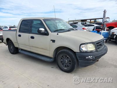 Czwarte zdjęcie samochodu z boku: 2001 FORD F150 SUPERCREW VIN:1FTRW07L11KC06911 - miniatura