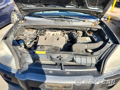 Zdjęcie 12 z 13 samochodu: 2008 HYUNDAI TUCSON SE VIN:KM8JN72D78U851615 - miniatura