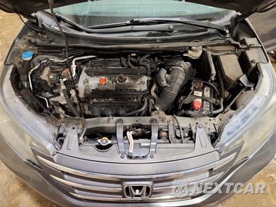 Zdjęcie 12 z 14 samochodu: 2014 HONDA CR-V EXL VIN:2HKRM4H72EH683236 - miniatura