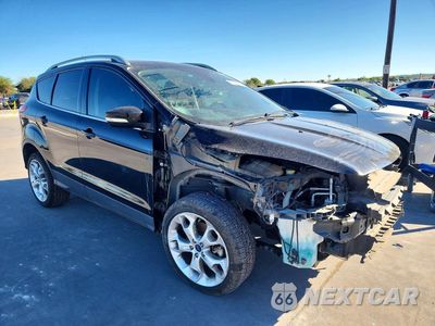 Czwarte zdjęcie samochodu z boku: 2016 FORD ESCAPE TITANIUM VIN:1FMCU0J97GUC78388 - miniatura