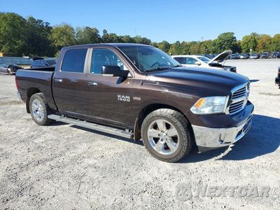 Czwarte zdjęcie samochodu z boku: 2017 RAM 1500 SLT VIN:1C6RR6LT7HS550499 - miniatura