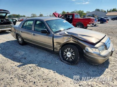 Czwarte zdjęcie samochodu z boku: 2004 FORD CROWN VICTORIA LX VIN:2FAFP74W64X115681 - miniatura