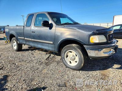 Czwarte zdjęcie samochodu z boku: 1997 FORD F150 VIN:1FTDX1861VNA17332 - miniatura