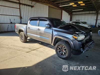 Czwarte zdjęcie samochodu z boku: 2021 TOYOTA TACOMA SR5 V6 VIN:3TMAZ5CN3MM144322 - miniatura