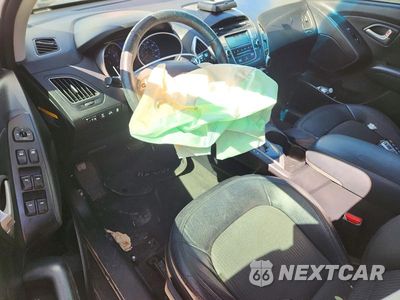 Zdjęcie 8 z 13 samochodu: 2013 HYUNDAI TUCSON GLS VIN:KM8JUCAC5DU662962 - miniatura