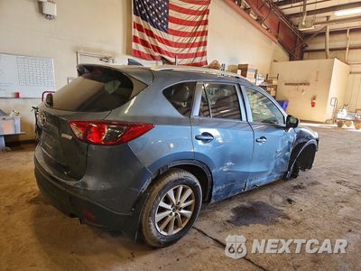 Trzecie zdjęcie samochodu z tyłu: 2016 MAZDA CX-5 TOURING VIN:JM3KE2CY1G0812688 - miniatura