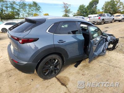 Trzecie zdjęcie samochodu z tyłu: 2022 MAZDA CX-30 PREFERRED VIN:3MVDMBCL0NM455764 - miniatura