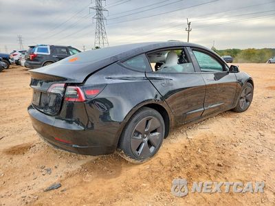 Trzecie zdjęcie samochodu z tyłu: 2023 TESLA MODEL 3 VIN:5YJ3E1EA8PF704304 - miniatura
