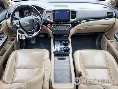 Zdjęcie 8 z 13 samochodu: 2016 HONDA PILOT ELITE VIN:5FNYF6H04GB111302 - miniatura